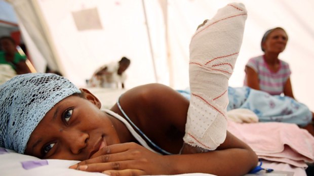 Berline Legeon, whose school collapsed on her, is treated at a Doctors Without Borders tent hospital in Carrefour, one of the hardest hit districts of the capital.