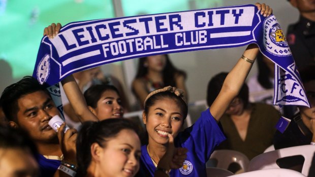 World-wide support: Leicester City fans are popping up everywhere, including Thailand.