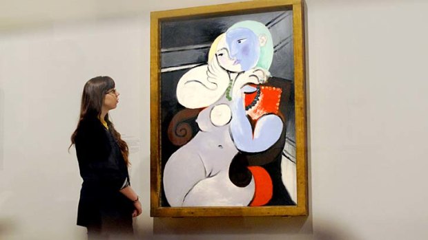 Pablo Picasso's 'Nude Woman in a Red Armchair' at the 'Picasso and Modern British Art' exhibition at the Tate gallery in London. Edinburgh Airport has reversed its decision to remove a print of the image.