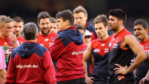 Paul Roos implores his charges to lift at Etihad Stadium on Sunday.