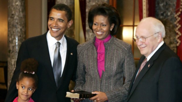 The Obama family, pictured with Dick Cheney in 2005.