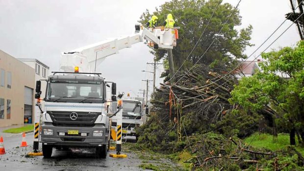 The clean-up under way in Kempsey.