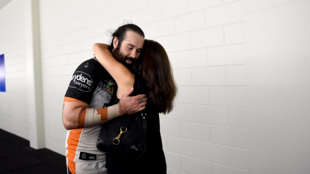 Aaron Woods and Wests Tigers chairwoman Marina Go at Townsville.