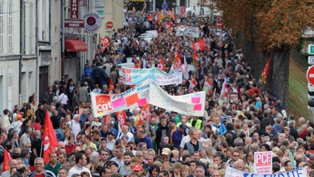United ... thousands demonstrated in Le Mans, western France, yesterday as workers across the country  protested against  plans to raise the retirement age.