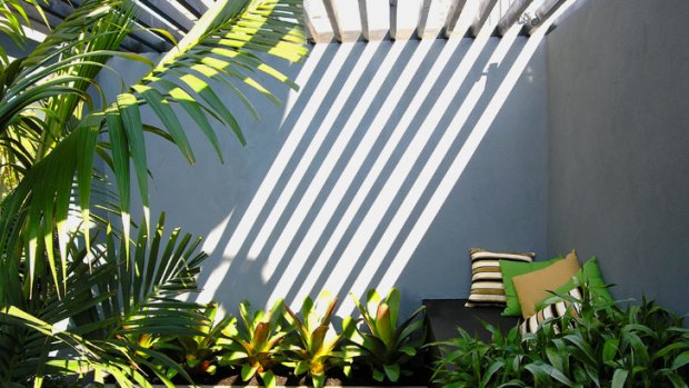Sun-scorched courtyards can be transformed with some clever cover.
