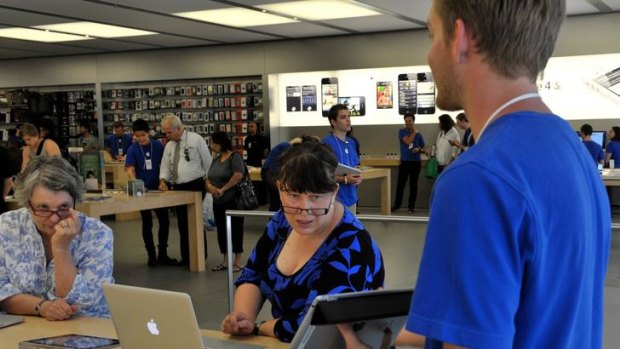 Apple users attend a workshop at the Apple store Doncaster Westfield.