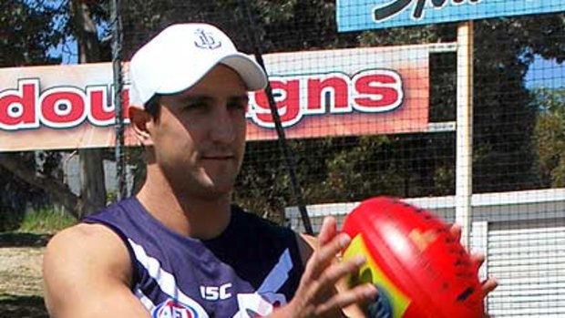 Fremantle Dockers captain Matthew Pavlich models the new guernsey.