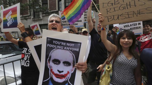 Rainbow rage: Demonstrators outside the Russian consulate in New York protest against Russia's homophobic legislation.