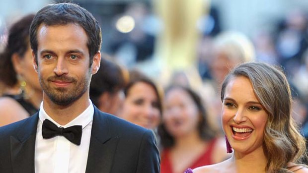 Beautiful, talented, super-smart ... Natalie Portman attends the Oscars with fiance Benjamin Millepied.