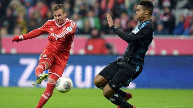 Mario Goetze scores Bayern Munich's second goal against Hamburg.