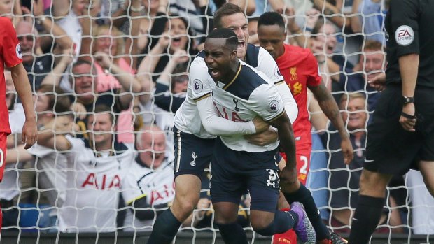 Tottenham's Danny Rose celebrates with his teammate Vincent Janssen after scoring a goal.
