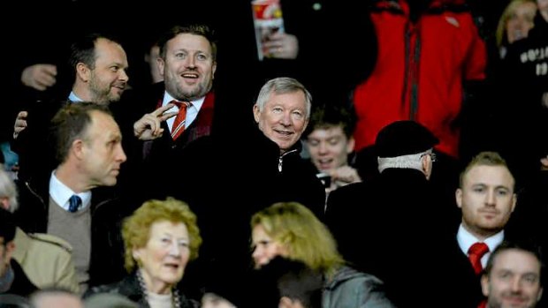 Big shadow: Manchester United's former manager Alex Ferguson has been a regular spectator at matches since retiring.