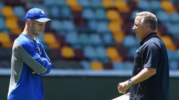 Change needed: Former Australian wicketkeeper Ian Healy speaks with Peter Nevill during an Australian nets session at The Gabba.