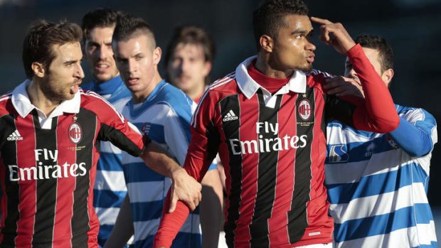 Racism protest ... AC Milan midfielder Kevin-Prince Boateng gestures towards the crowd.