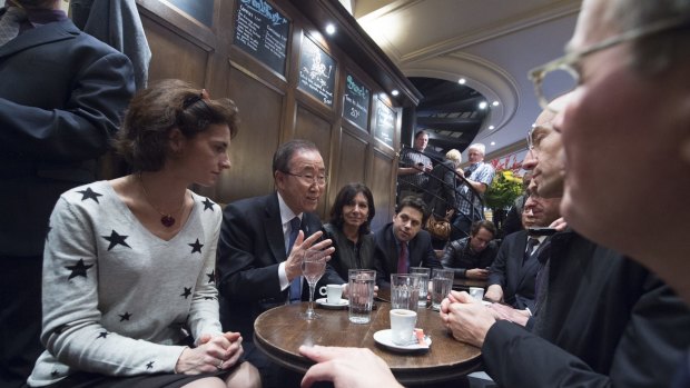 Ban visits La Bonne Biere cafe with Anne Hidalgo (centre), Mayor of Paris. Five people were killed at the cafe by a squad of Islamic extremist gunmen on November 13.