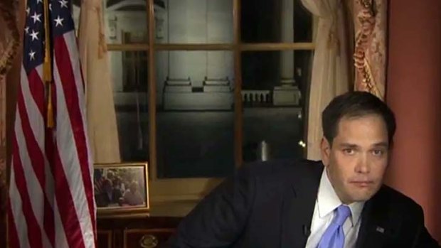 Marco Rubio reaches for water during his State of the Union response.
