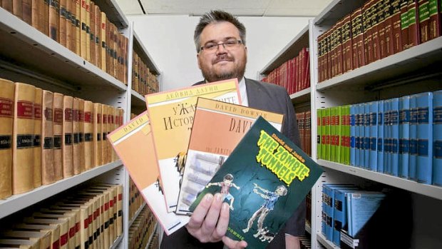 Lawyer and children's author David Downie with some of the titles he's written.