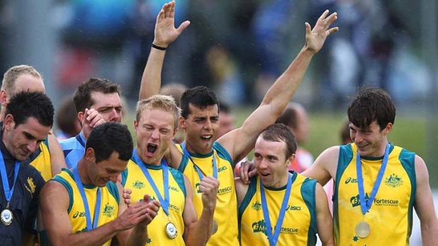 Too easy: Australia celebrates after winning the Champions Trophy final last year against Spain.