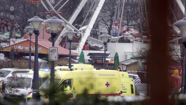 Ambulances are seen near a Christmas market at the scene of attack.