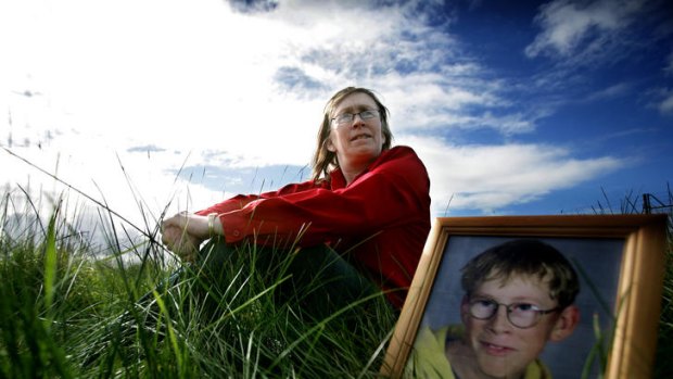 Mum Jo-Ann Adams with a picture of son Gary.