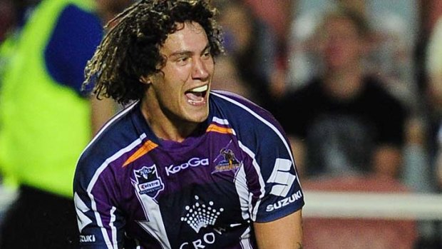 Kevin Proctor of the Storm celebrates his try.