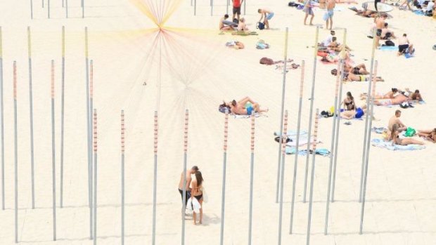 Sydneysiders flocked to the beach, and Sculpture by the Sea, on Saturday as temperatures soared beyond the mid-30s. 
