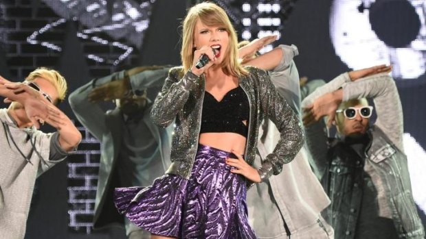Are Us pollies taking advantage of Tay-Tay? ... Taylor Swift performing during her 1989 world tour in Tokyo.