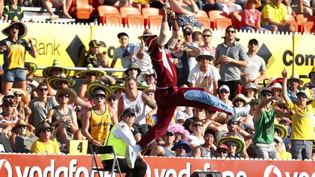Is it a bird? Is it a plane?  ... No, it’s the Windies’ Kieron Pollard stretching high to dismiss George Bailey at Manuka Oval, Canberra, on Wednesday. Bailey hit 44 runs from 22 balls.