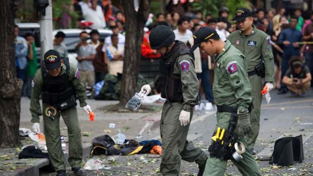 Bangkok blast ... Police have reported five people are injured and the attacker has lost his legs.