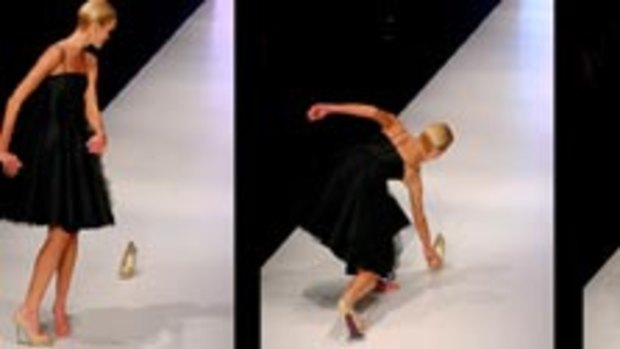 If the show fits (above) a model realises she's strutting sans stiletto before retrieving it to a round of applause from the audience.