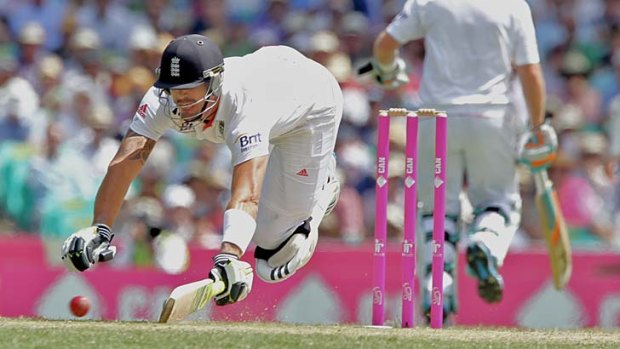 Desperate times ... Kevin Pietersen makes a dive for the crease on day two.