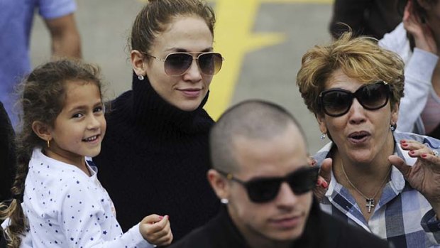 Family affair ... Jennifer Lopez with her daughter, Emme, mother Guadalupe Rodriguez and boyfriend, Casper Smart.