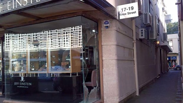 Smashed window ... this jewellery store was allegedly robbed this morning.
