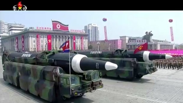Missiles are paraded at Kim Il-sung Square in Pyongyang.