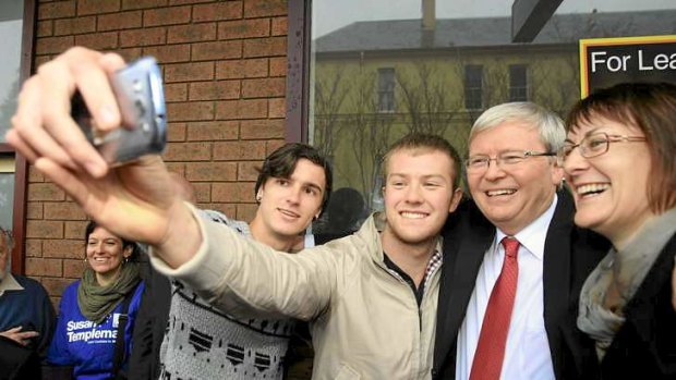 PM Kevin Rudd with (from left) Josh Morris, 17, James Kruik, 19, and local candidate Susan Templeman.
