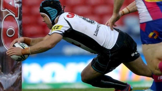 Experience: Jamie Soward crosses for a try.