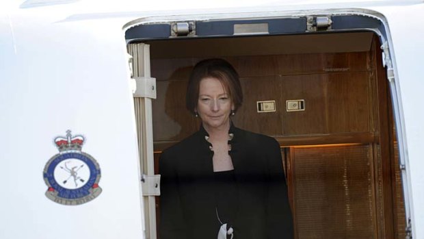 Trips to Tasmania: Former prime minister Julia Gillard disembarking an Air Force jet.