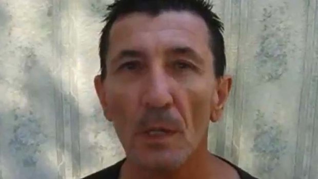 Hostage Warren Rodwell shown on Thursday the 27th of December 2012 in a YouTube video confirming that he is alive.