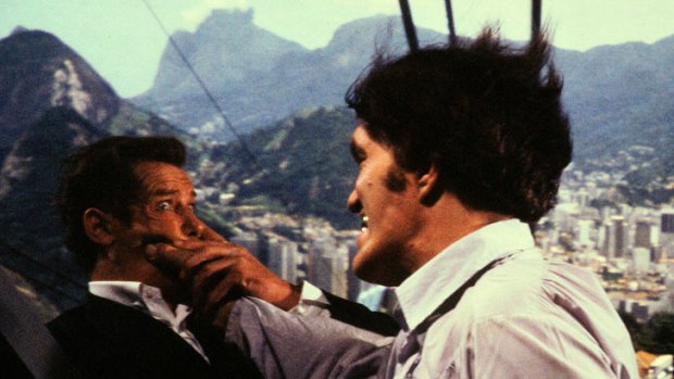 Richard Kiel in a scene from the James Bond film "Moonraker" with Roger Moore.