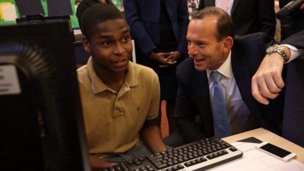 Prime Minister Tony Abbott, right, visited the Pathways in Technology Early College High School in Brooklyn, New York.