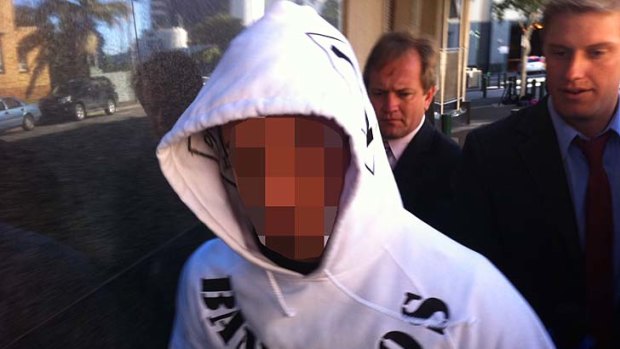 A 25-year-old member of the Bandidos outlaw bikie gang leaves the Brisbane watchhouse after being charge over an attack on rival bikies.