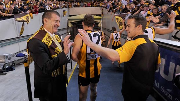 The other side of Kennett: The former Hawthorn president with coach Alastair Clarkson after the Hawks beat Adelaide in the preliminary final last year.