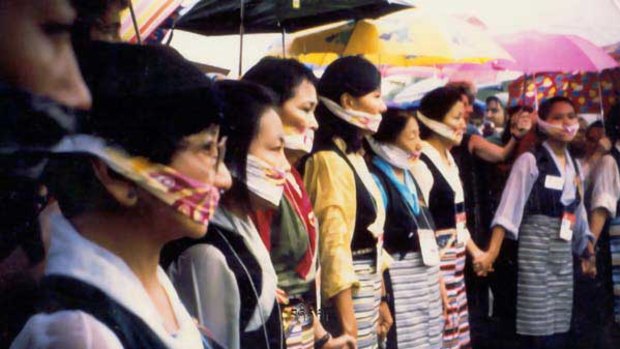 Dorji in the red shirt fourth from left, and Kesang, three women further along, at the women’s protest in Beijing in 1995. <i>Picture: Craig Sillitoe</i>