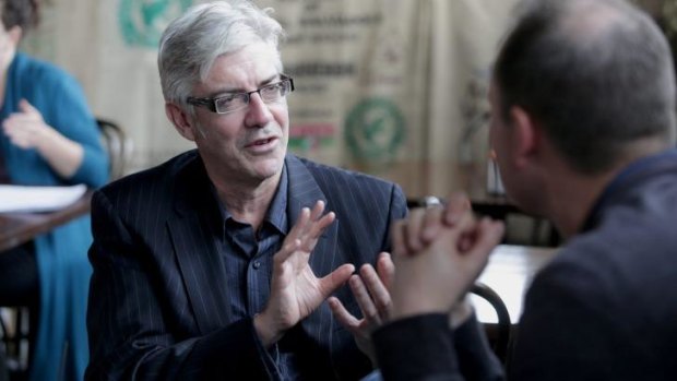 Efficient eating: Writer, actor and comedian Shaun Micallef at the Goat House Cafe Roastery in Elsternwick.