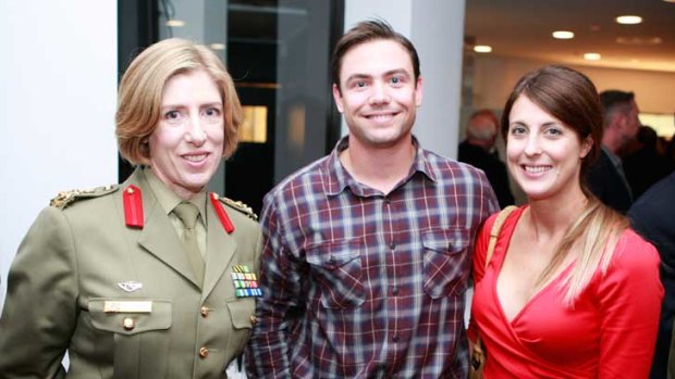 Brigadier Alison Creagh, Director General of the ADF theatre project, with Corporal Scott Tampalin and his wife Angela at the Adelaide premiere of <i>A Long Way Home</i>.