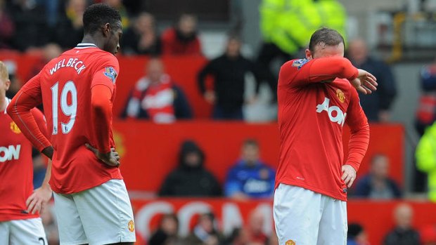 Can't watch ... Manchester United's Wayne Rooney during the 4-4 draw with Everton