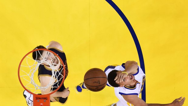 In the headlines: Stephen Curry of the Golden State Warriors shoots against Matthew Dellavedova  of the Cleveland Cavaliers during game one of the  NBA finals on June 4 in Oakland, California. 