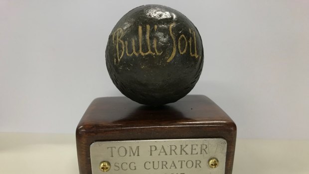 The 'Bulli Soil'' memento presented to outgoing SCG curator Tom Parker.