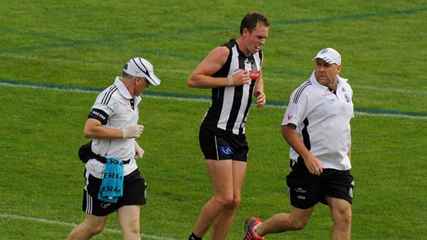 Magpie skipper Nick Maxwell limps off.