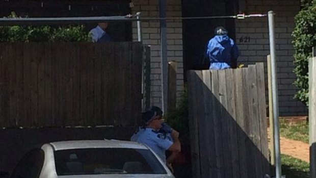 Police at the scene of a triple stabbing in Carina. Photo: Deon Davies/Ten News, via Twitter.
